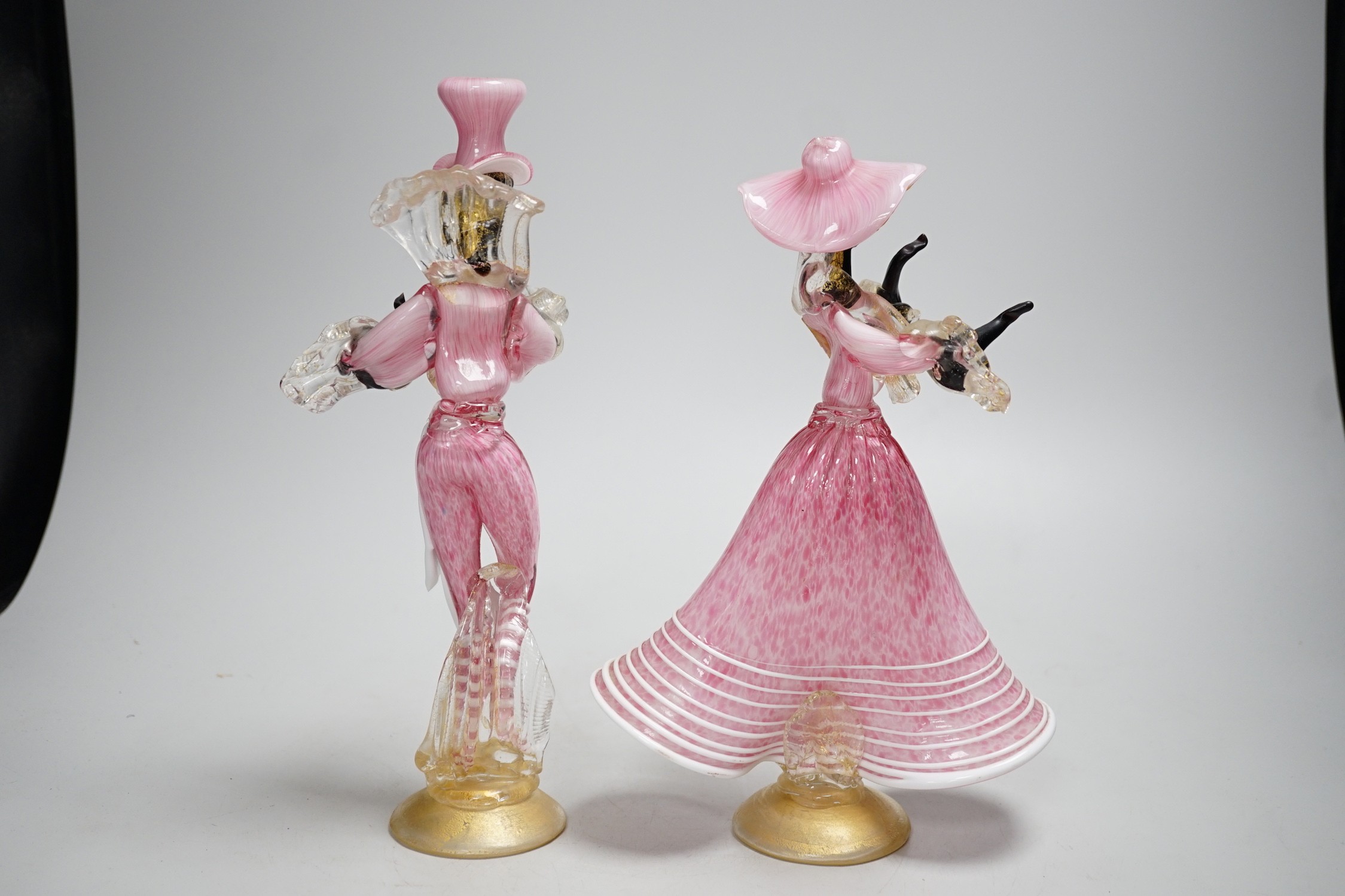 A pair of pink Italian glass Murano dancing figurines. Tallest 28cm